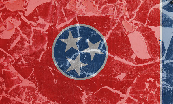 The national flag of the US state Tennessee in against a gray wall with cracks and faults on the day of independence in colors of blue red. Political and religious disputes, customs and delivery.