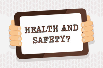 Handwriting text writing Health And Safety question. Conceptual photo regulations and procedures intended to prevent accident Color Tablet Smartphone with Blank Screen Handheld from the Back of Gadget