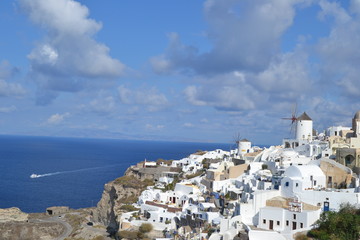 Fototapeta na wymiar Windmill Scene of Oia Santorini 