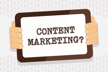 Handwriting text writing Content Marketing question. Conceptual photo involves creation and sharing of online material Color Tablet Smartphone with Blank Screen Handheld from the Back of Gadget
