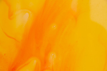 Shiny yellow and orange abstrack wall surface background