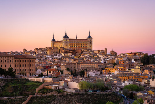 Panoramic view of Toledo with Alcazar castle at sunset, Castilla-La Mancha, Spain