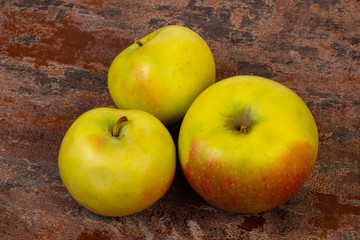 Ripe apples over background