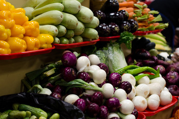 big choice of fresh fruits and vegetables on market counter