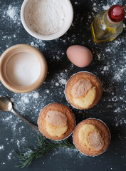 Homemade muffins on black table