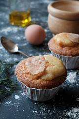 Homemade muffins on black table