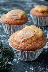 Homemade muffins on black table
