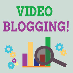 Word writing text Video Blogging. Business photo showcasing form of blog for which the medium is video Web television Magnifying Glass Over Bar Column Chart beside Cog Wheel Gears for Analysis