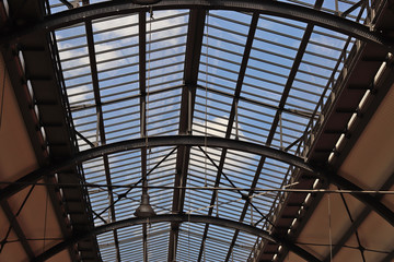 Ceiling of a train station made of steel and glass
