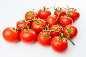 Tomato branch. Tomatoes isolated on white