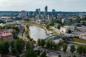 Fototapeta na wymiar Vilnius, Lithuania A view over the modern downtown of the capital and the Neris River.