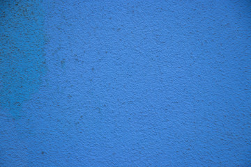Blue painted wall concrete stucco surface texture