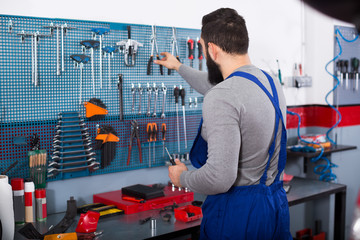Young man is ready to use his tools