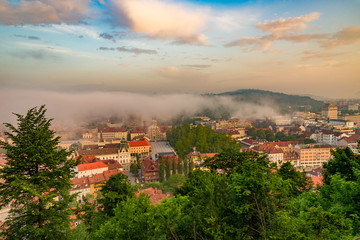 foggy sunrise at capitol of Slovenia, Ljubljana in summer