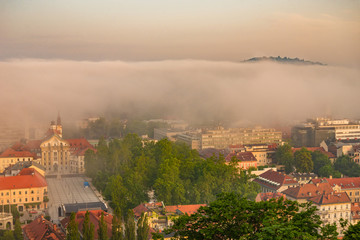 foggy sunrise at capitol of Slovenia, Ljubljana in summer