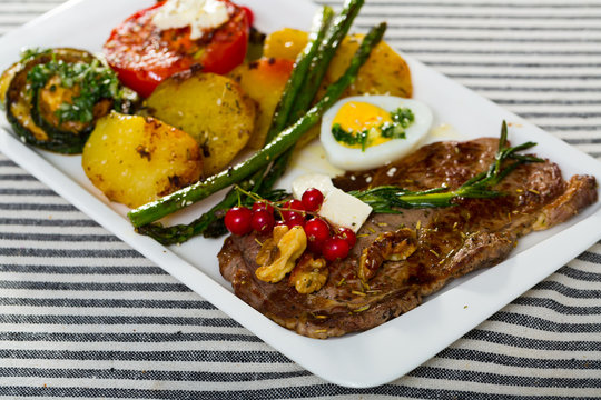 Image of veal with baked vegetables