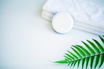 White towels on white table with copy space on bath room background