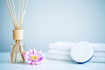 White towels on white table with copy space on bath room background