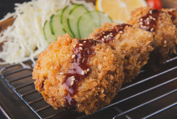 Japanese deep fried pork chop or menchikatsu.
