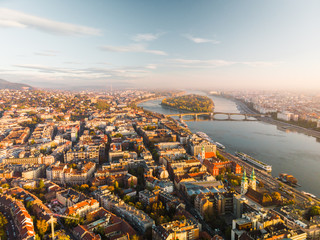 Aerial view of Budapest from above with Dunabe river and Margaret Island during mystical sunrise in autumn on a calm morning (Budapest, Hungary, Europe)