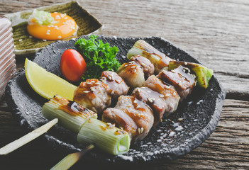 Japanese style skewers pork grilled.