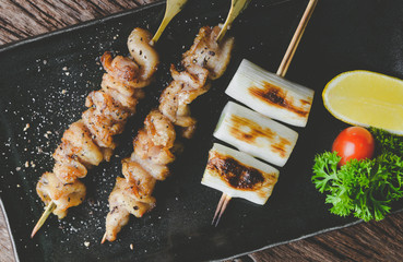 Japanese style skewers chicken skin grilled.