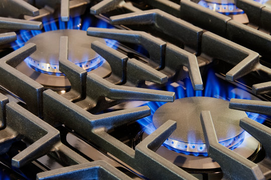 Ignited Gas Burning on Commercial Stove