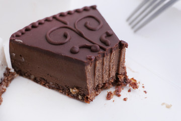 Eating Vegan Chocolate Cake with Decoration