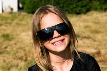 Little girl with black glasses