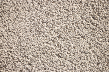 Beige painted grunge wall rough texture