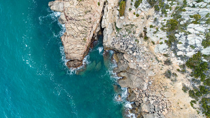 Cliffs and rocks and sea aerial view 