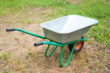 hand truck on one wheel. Garden or construction. Green Summer