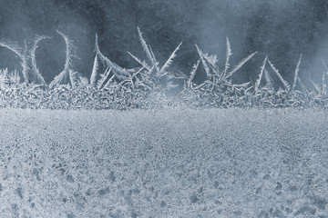 ice patterns on a winter window. Seasons of nature and uniqueness