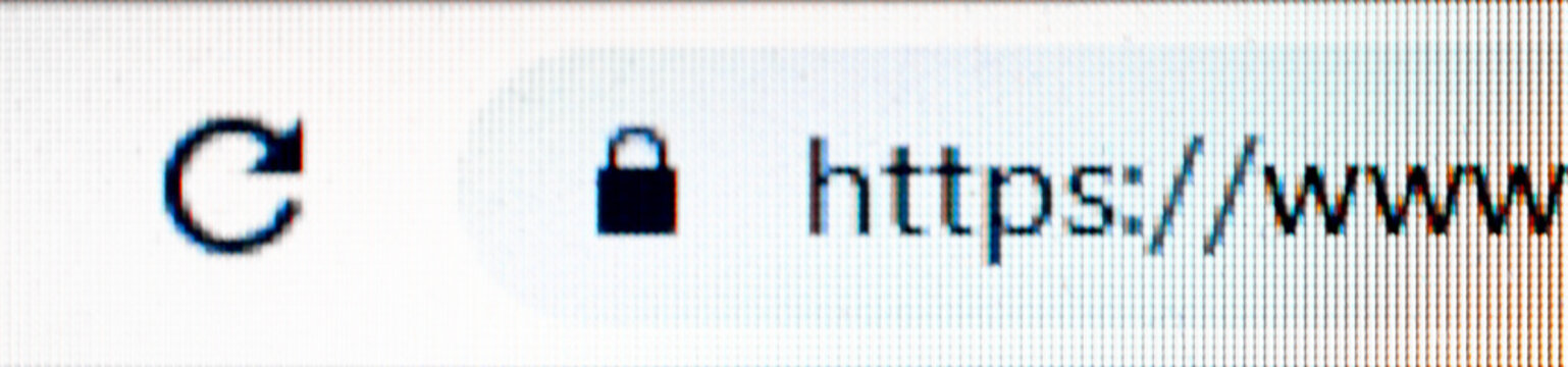 Internet security concept. SSL Https and lock symbol in computer browser on computer or laptop screen.
