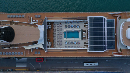 Aerial top view photo of cruise ship liner docked in Mediterranean destination