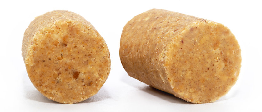 Sweet Brazilian peanut called Pa&ccedil;oca, in white background and space for text, copy text, sweet typical of Brazil. It is present in all the Juninas Festivals. Northeastern and Minas Gerais tradition.