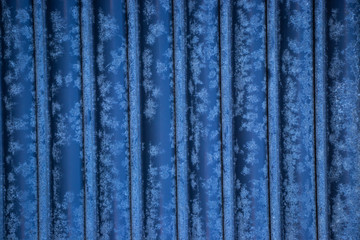 Blue painted worn corrugated metal texture background
