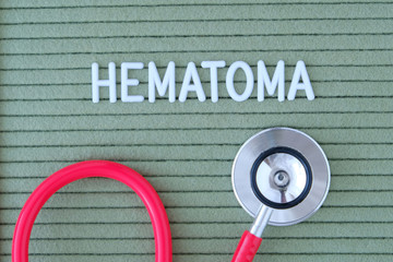 Hematoma- text from white letters on  green background with  stethoscope, medical concept...