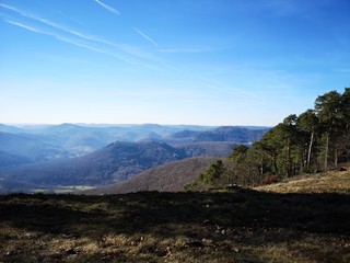 Blue Sky with brown mountains and trees, Pfaelzer Wald 