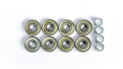 Bearing isolated on white background in two rows with steel tubes