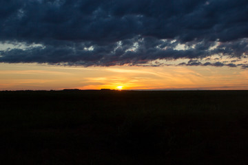 Natural Sunset Sunrise Over Field Or Meadow