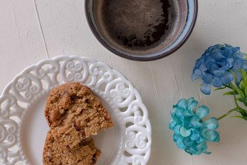 Cup of Coffee and Cookies in a Plate isolated on a White Background