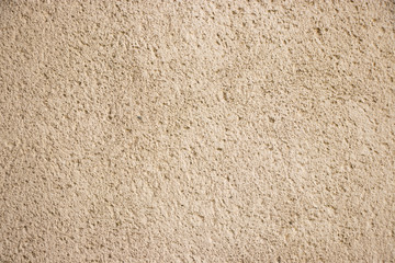 Beige painted grunge wall rough texture