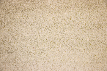 Beige painted grunge wall rough texture