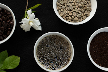 Colorful layflat photo of roasted coffee beans, coffee grounds and fresh coffee | Food photography 