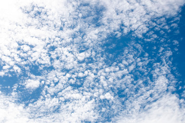 cirrocumulus clouds in the blue sky