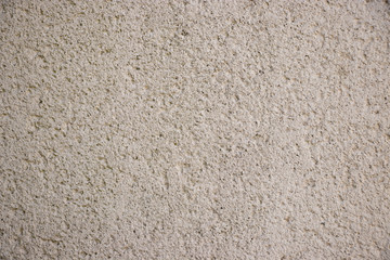 Beige painted grunge wall rough texture