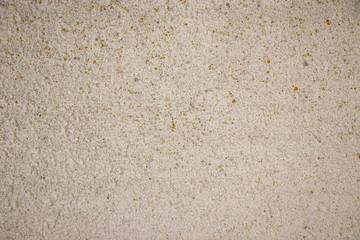 Beige painted grunge wall rough texture
