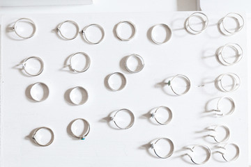 Silver rings with gems for sale at shopping showcase