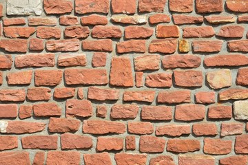 Verfugte Hausmauer aus behauenen Sandstein-Quadern